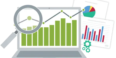 Analisi di grafici e dati su un laptop, con lente d'ingrandimento e ingranaggi, per monitorare gli indici di produttività.